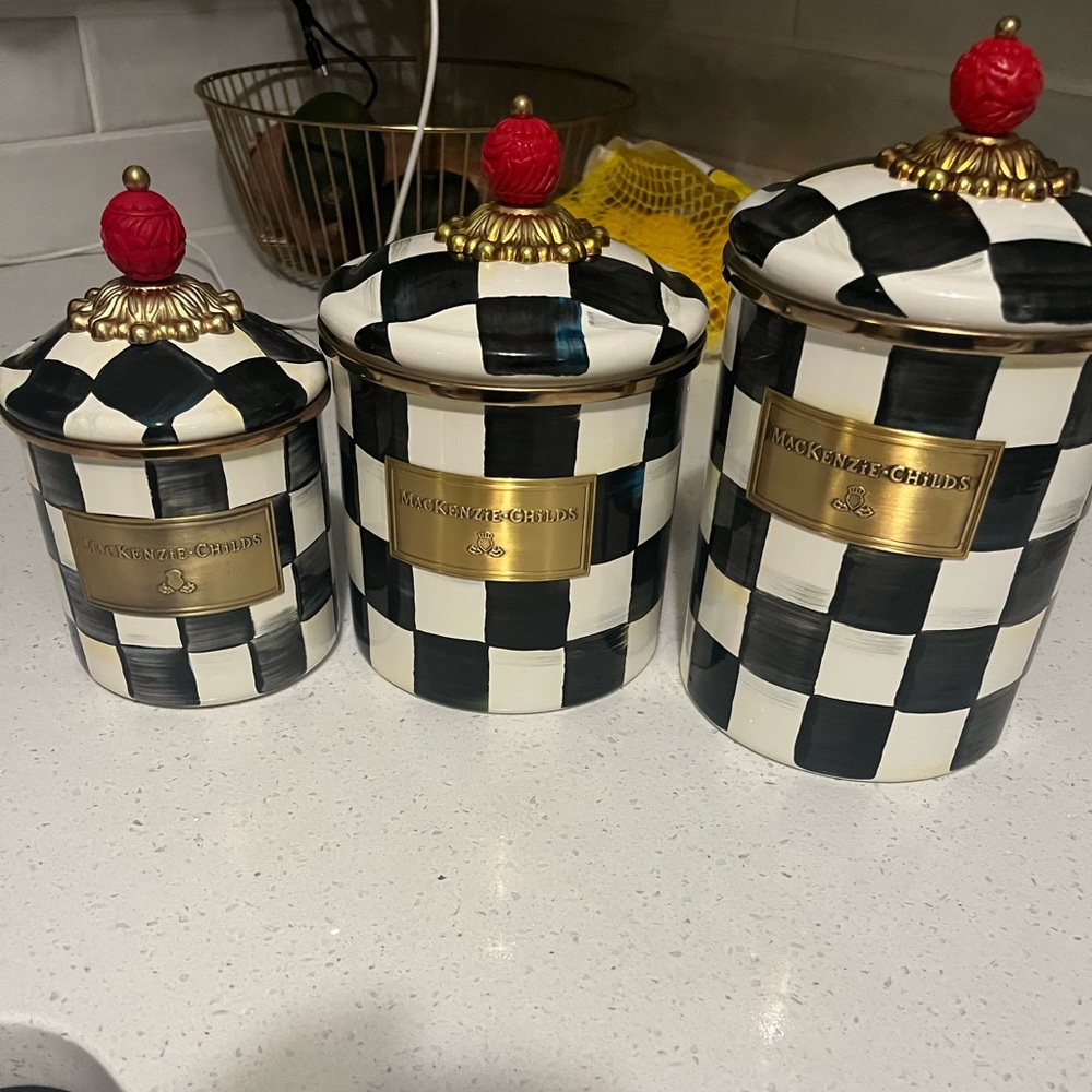 MacKenzie-Childs Black and White Checkered Canisters with Red Accents